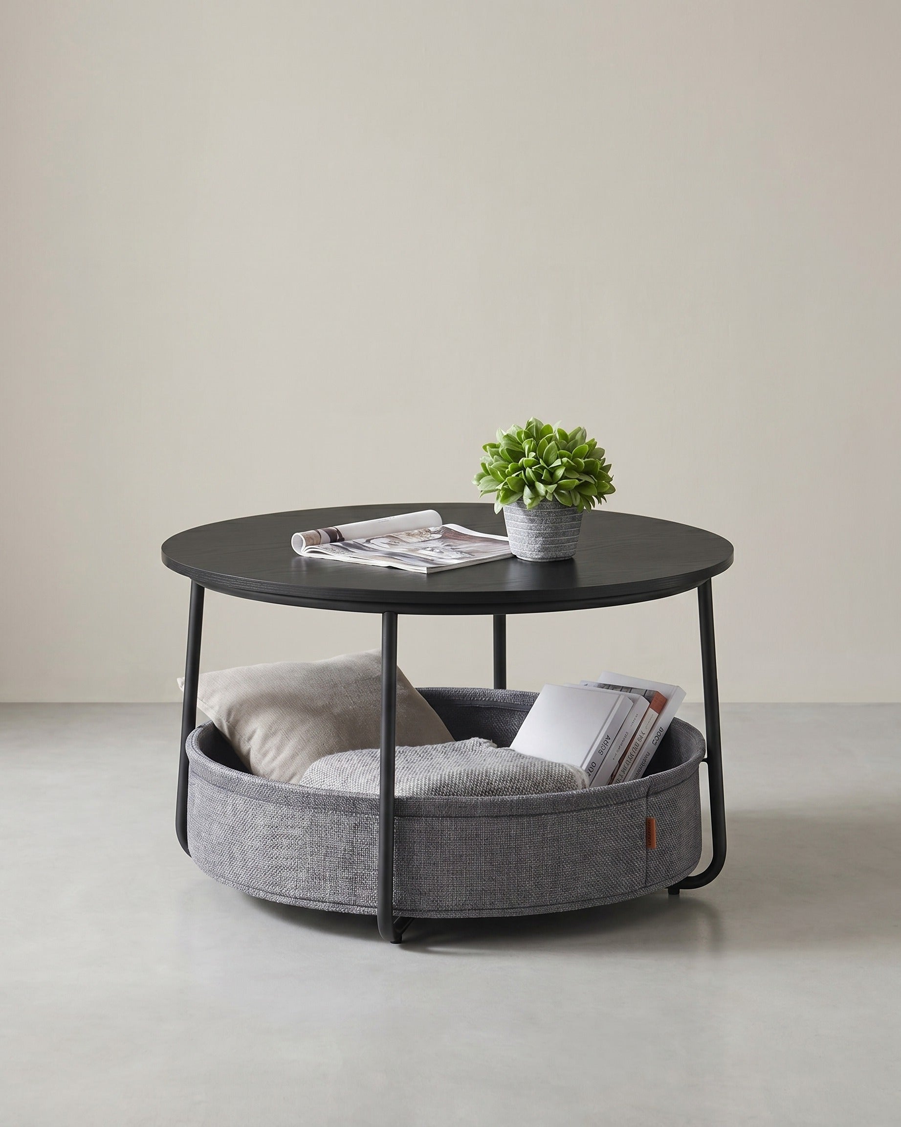 Ronde salontafel met opbergmand - Stijlvol en praktisch - De Vries Meubels